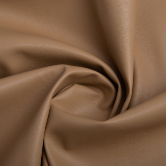 The fabric is faux leather on suede карамель